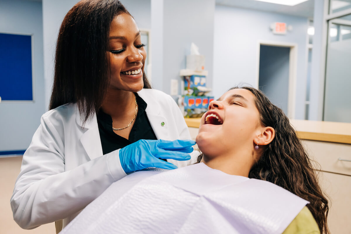 CDP dentist with female patient.